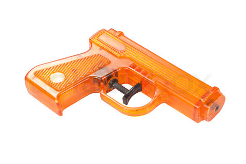 Orange plastic water pistol isolated on a white background